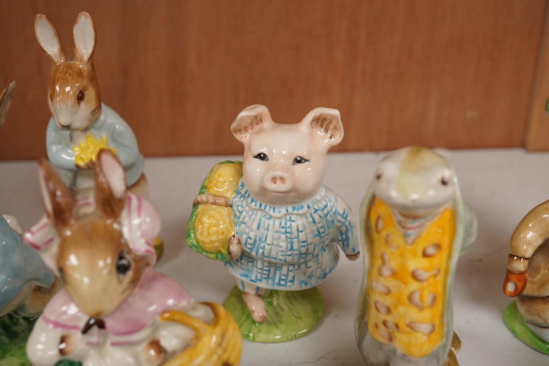 Twenty Beatrix Potter figures, mostly later production figures, largest 11cm high